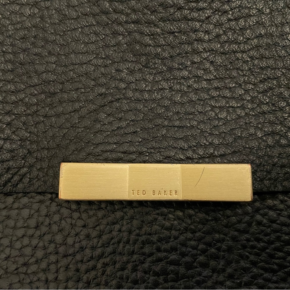 ted baker pebbled leather purse with gold woven chain.